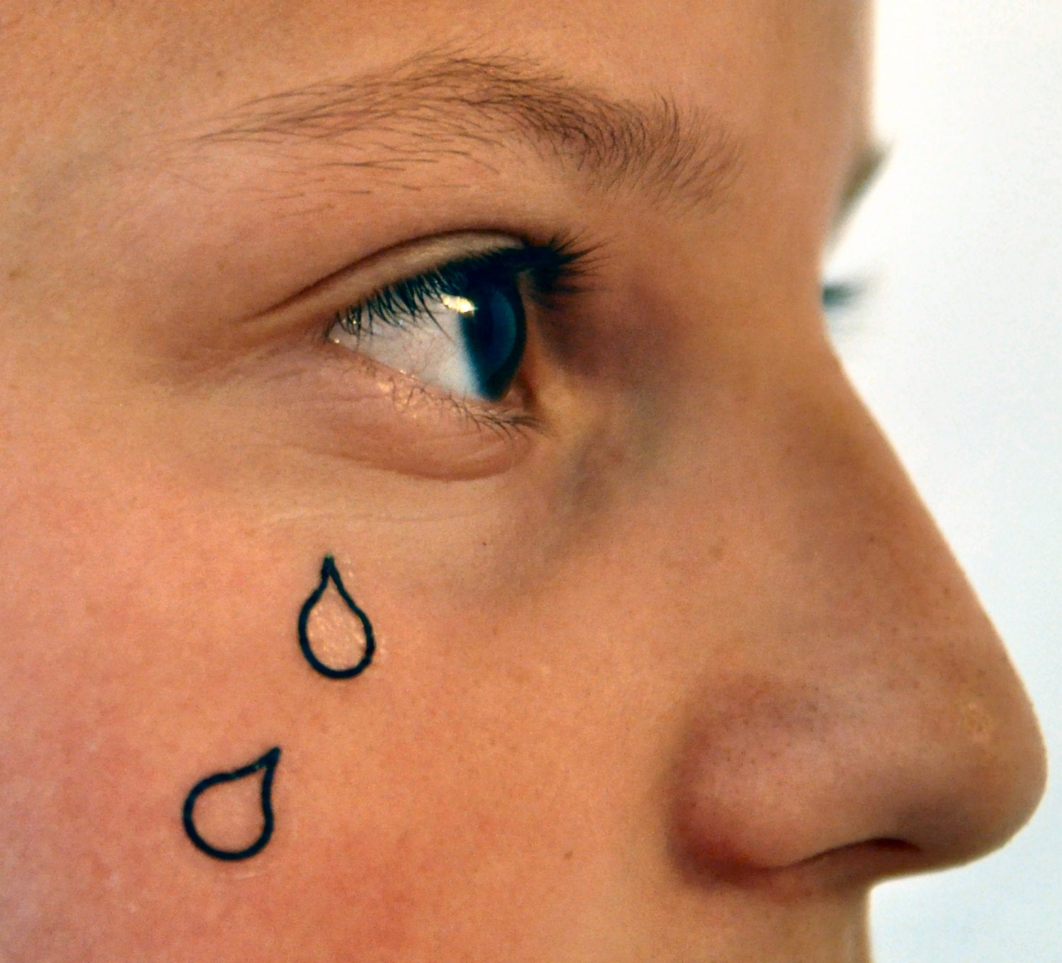 Significado da tatuagem de lágrima no rosto